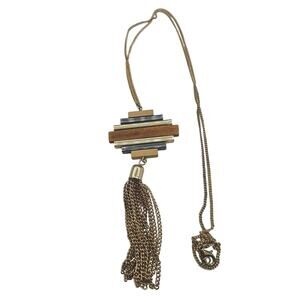 Long gold-tone tassel pendant necklace, with a geometric Tassel pendant